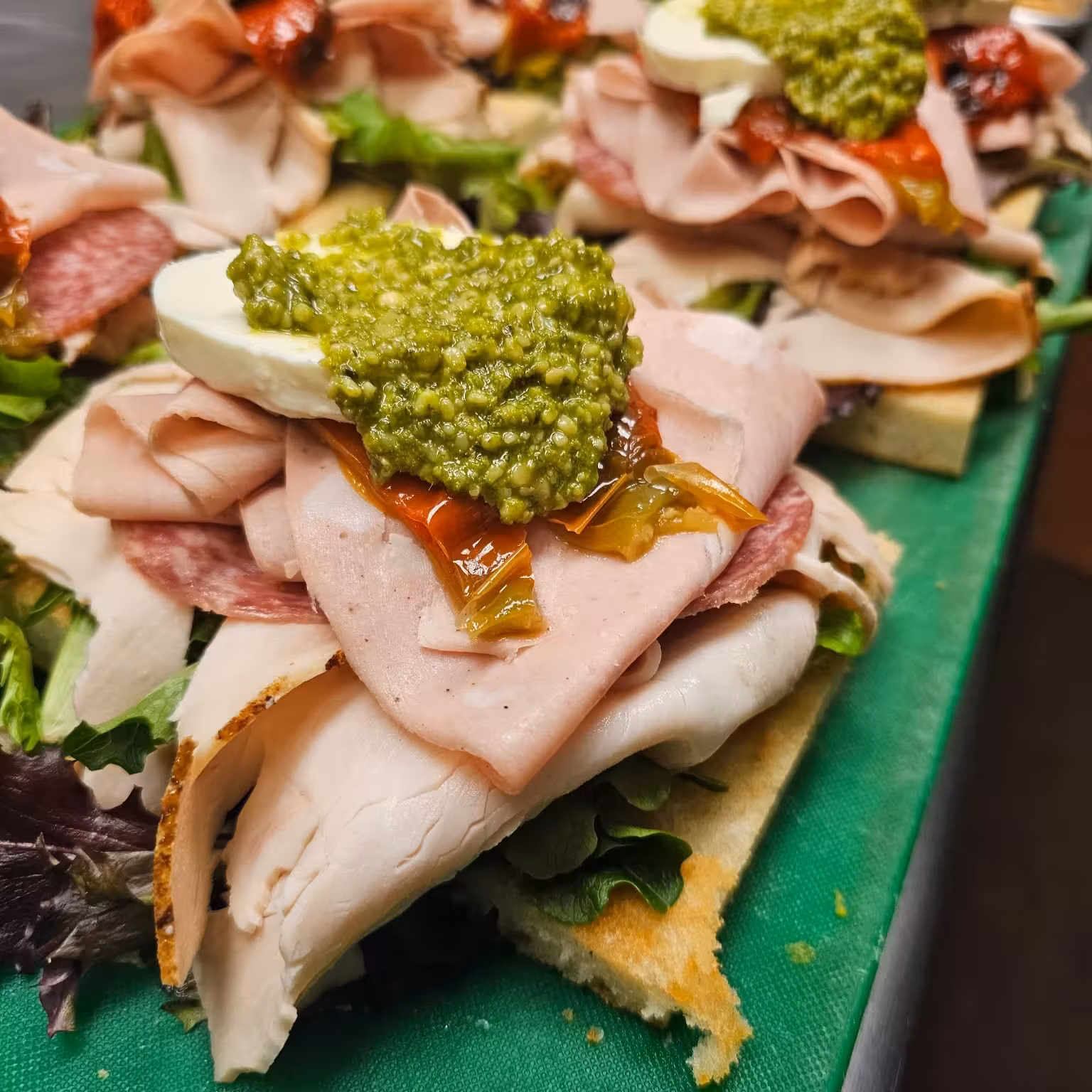 Turkey pesto open face sandwich